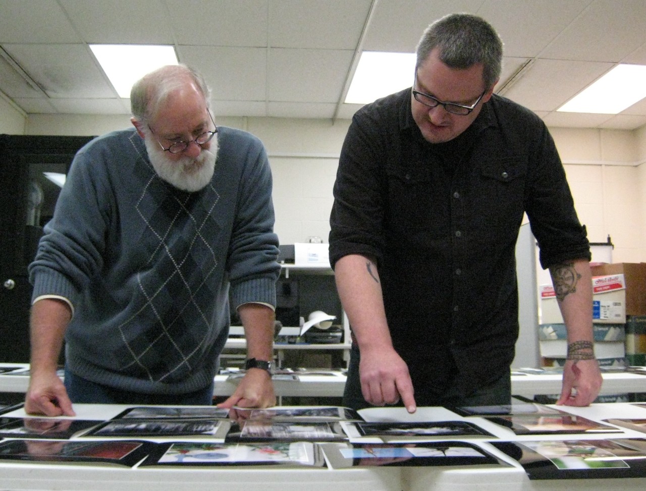 H. Michael Sanders and Matt Bennett working on the Tao of photography exhibit