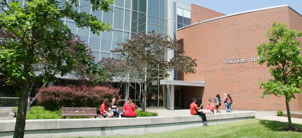 Students sitting outside of Walters Hall