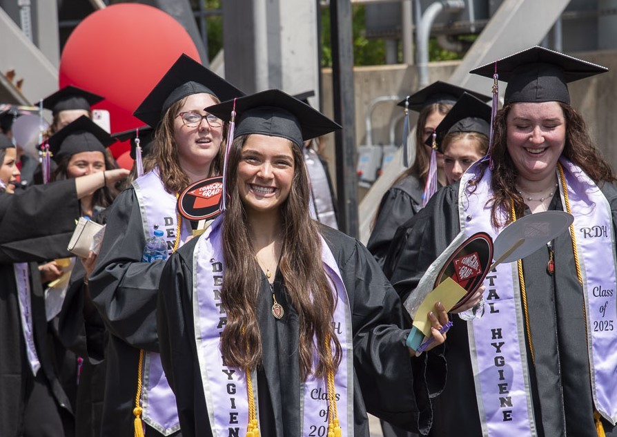 students celebrating at commencement ceremony