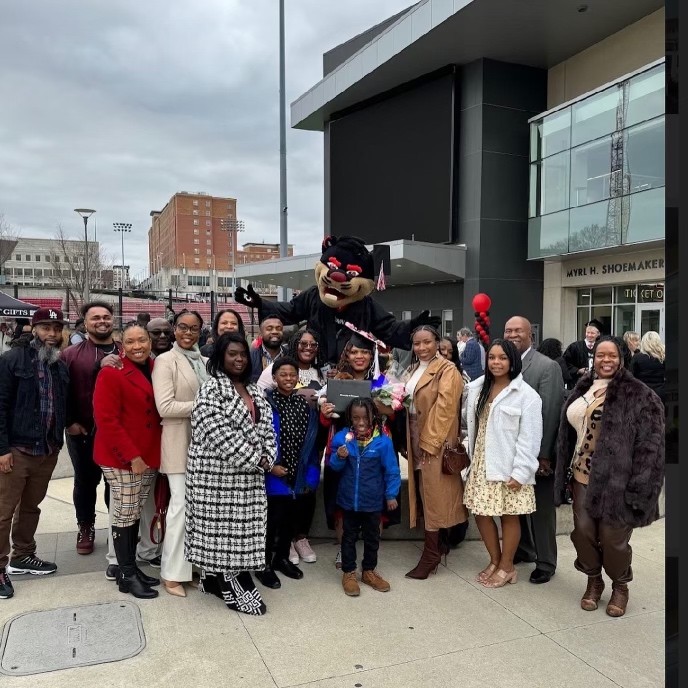 Nadege Mondesir with family group at commencement ceremony