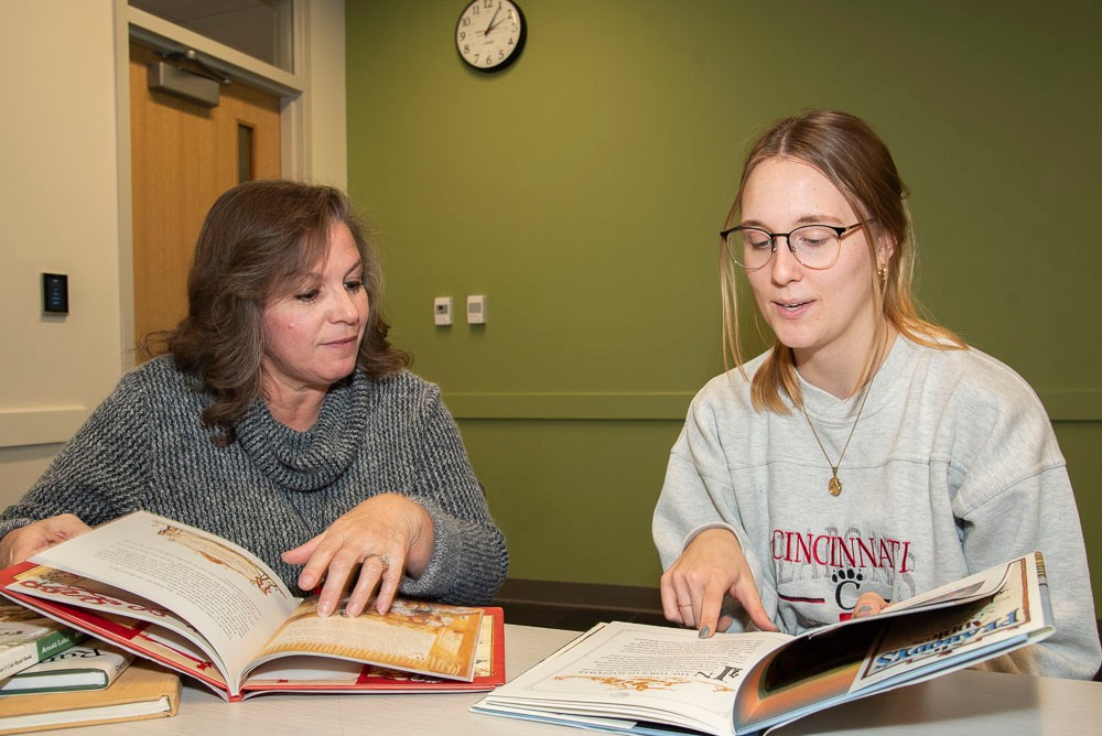 Sophia working with a female professor
