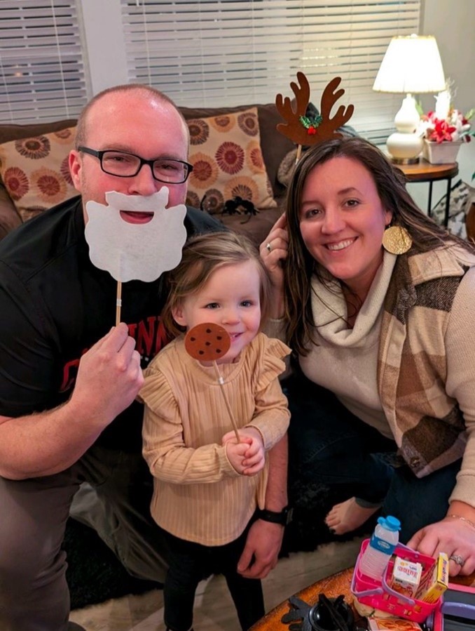 Kelsi Becker with husband and daughter