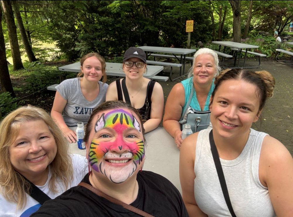 selfie of family group at the zoo