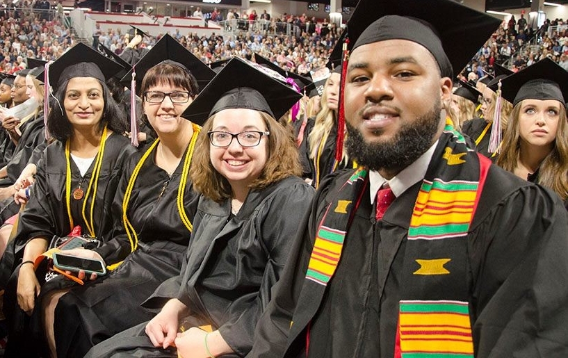 Students in caps and gowns at commencement ceremony